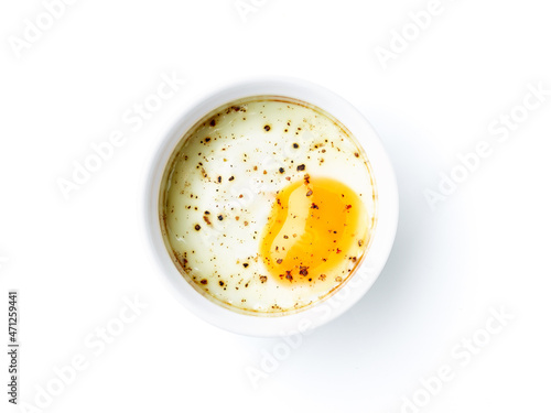 Baked egg isolated on white, from above