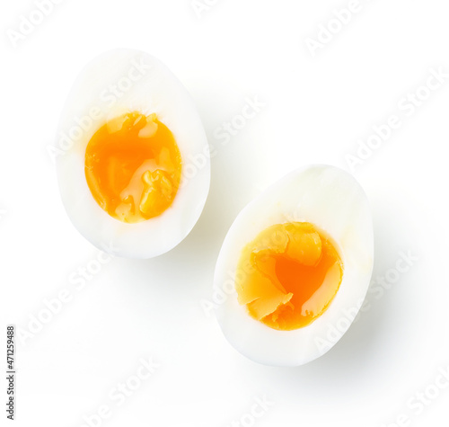Soft boiled eggs isolated on white, from above