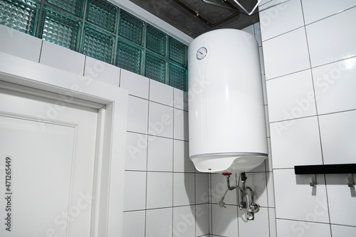 Schilderij op canvas Modern gas tanked boiler in bathroom