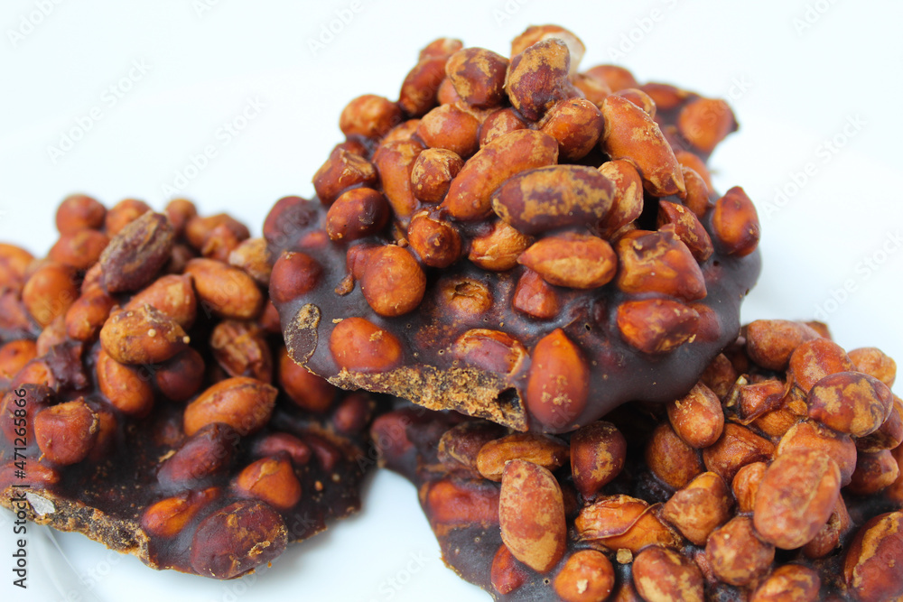Gula kacang, is a traditional snack from Indonesia, made from roasted peanuts and brown sugar. Also called as Ampyang