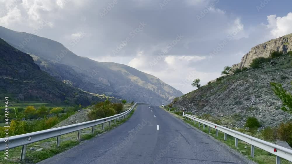 Curvy road on cloudy day in highlands Curvy road on cloudy day in highlands
