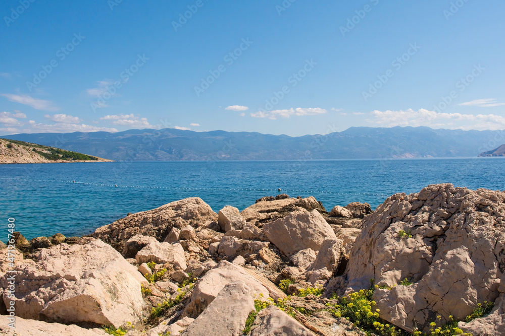 The coast south east of Baska in the south of Krk Island, in the Primorje-Gorski Kotar County of western Croatia in late summer
