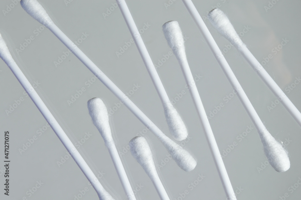 Heap of cotton swabs on a white background, hygienic cosmetic and medical supplies. Heap of cotton swabs on a white background, hygienic cosmetic and medical supplies.