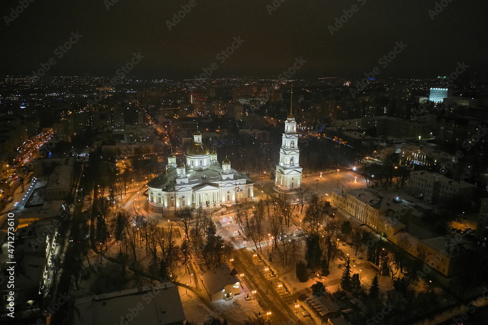 Scenic aerial view of ancient orthodox Spassky cathedral in center of old historic touristic city Penza in Russian Federation. Beautiful winter look of old orthodox church in nighttime illumination