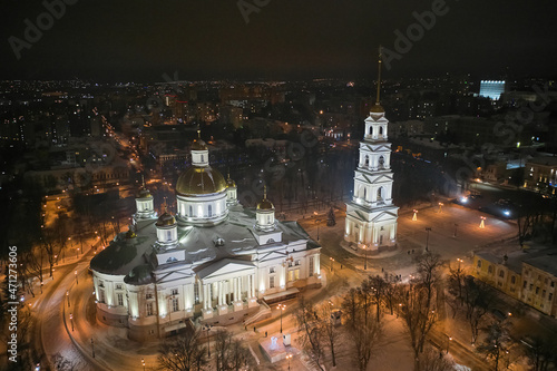 Scenic aerial view of ancient orthodox Spassky cathedral in center of old historic touristic city Penza in Russian Federation. Beautiful winter look of old orthodox church in nighttime illumination