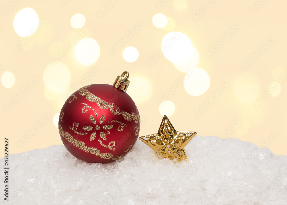 Red ball with an ornament on white snow. Christmas holiday. Red ball with an ornament on white snow. Christmas holiday.