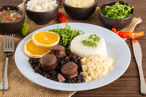 Feijoada typical Brazilian food. Traditional Brazilian food made with black beans photo