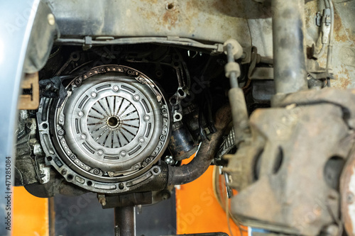 Close-up photo of a car clutch. Auto garage. Automobile repair