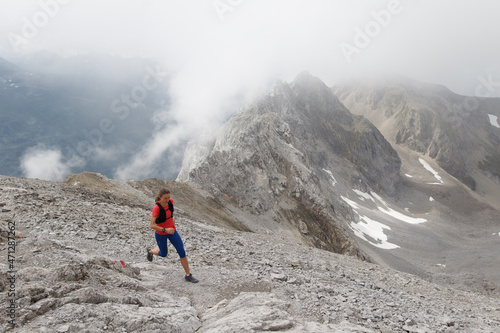 Women trail running in the European alps of Austria