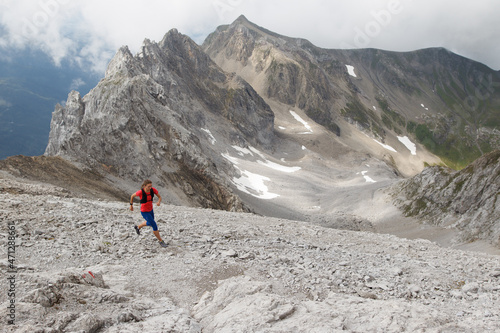 Women trail running in the European alps of Austria