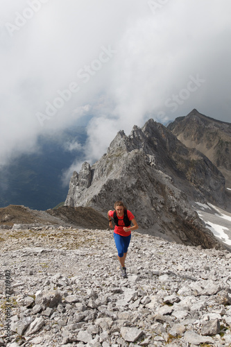 Women trail running in the European alps of Austria