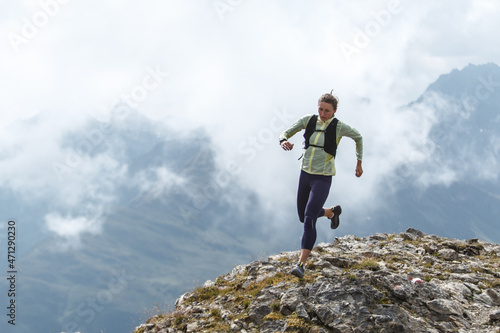 Women trail running in the European alps of Austria