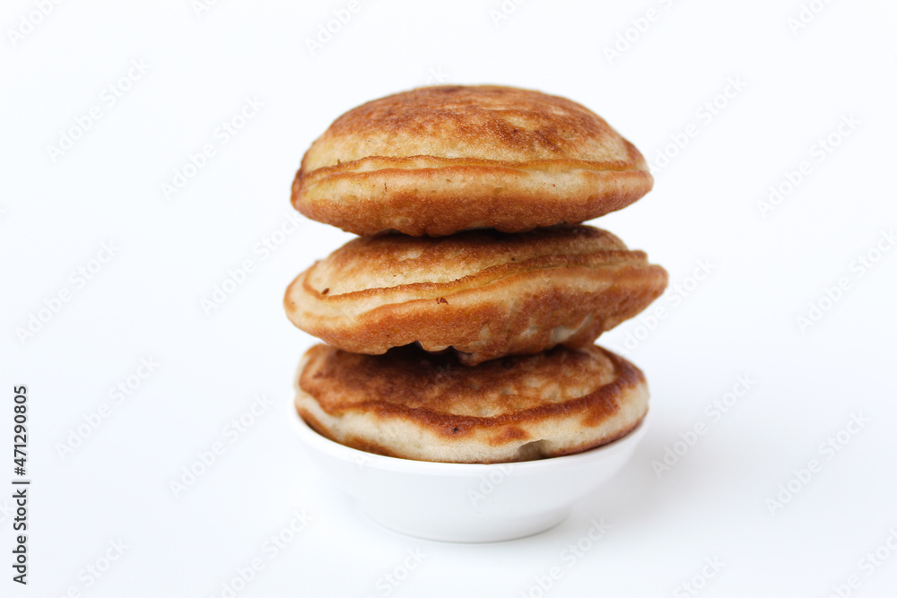 Kue Samir or Kamir or Khamir, traditional pancake from Pemalang, Indonesia. Isolated on whte background. Side view. Kue Samir or Kamir or Khamir, traditional pancake from Pemalang, Indonesia. Isolated on whte background. Side view.