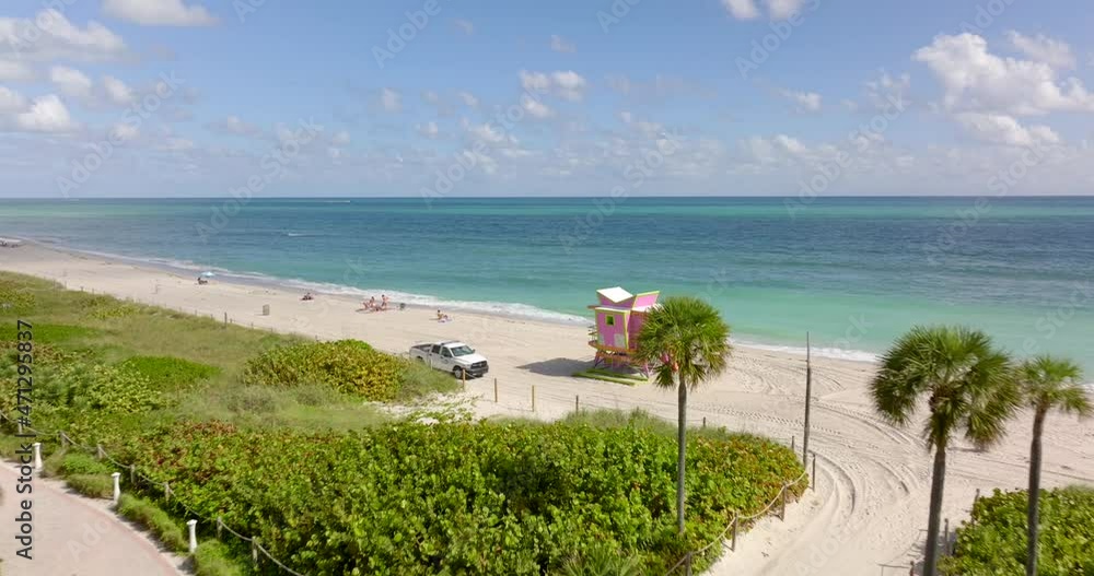 Aerial 5k video of a Miami Beach lifeguard tower painted pink Aerial 5k video of a Miami Beach lifeguard tower painted pink