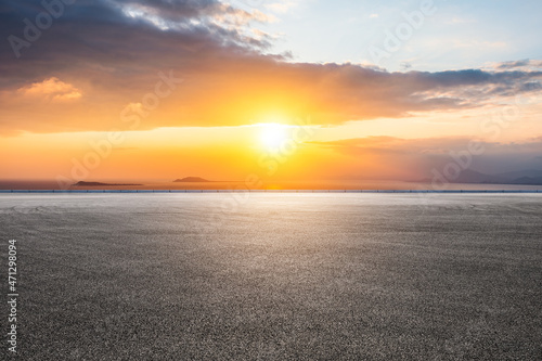 Photography Asphalt road and sea scenery at sunrise, road and sky background.
