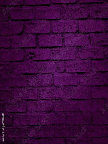 close up shot at the surface of dark violet bumpy brick pattern wall with stamped of dog footprint. artificial stone brick wall texture for loft  industrial concept design. high defination image.