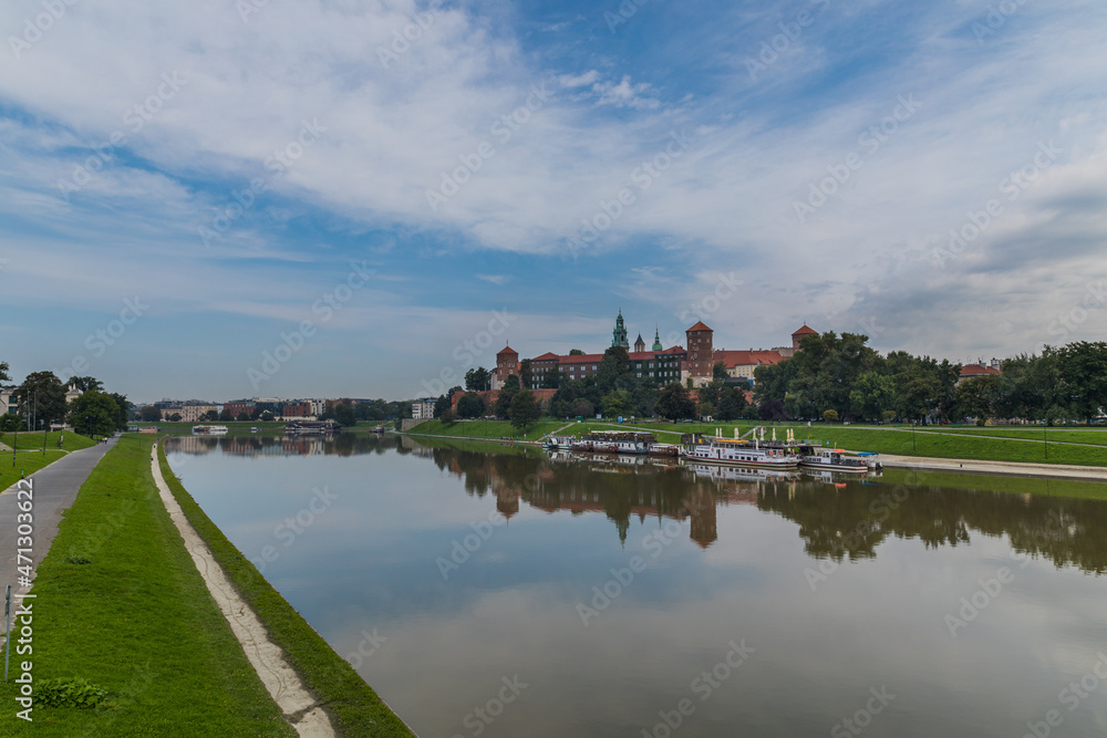 The Vistula River and the Wawel Hill with the historic building of the Royal Castle in Krakow, Poland.