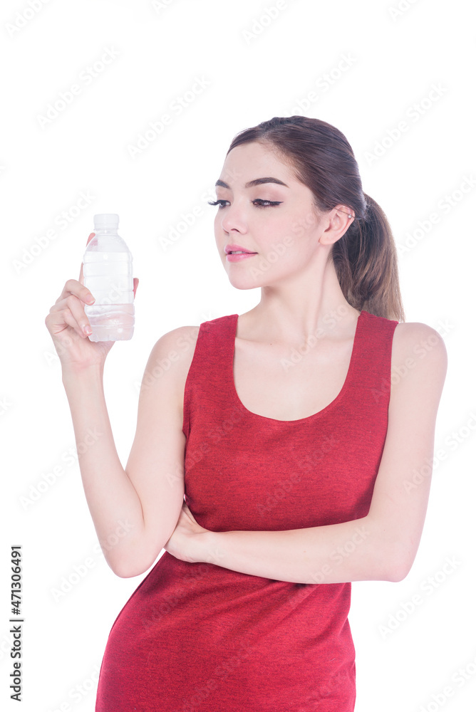 beautiful woman in red dress drinking water from plastic bottle isolated on white background beautiful woman in red dress drinking water from plastic bottle isolated on white background
