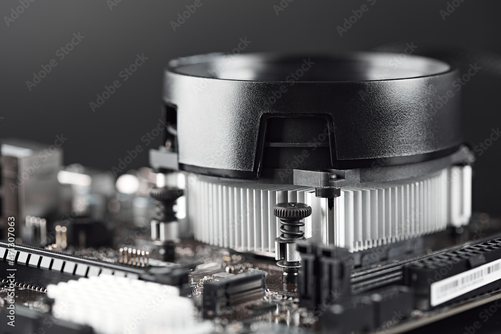 Computer Motherboard and graphics cards, bitcoin mining and cryptocurrency. Close-up on several GPU. Bitcoin Cryptocurrency coin on a PC computer motherboard, crypto currency mining concept. Computer Motherboard and graphics cards, bitcoin mining and cryptocurrency. Close-up on several GPU. Bitcoin Cryptocurrency coin on a PC computer motherboard, crypto currency mining concept.