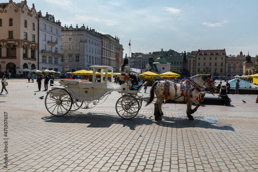 Horse carriages at main square in Krakow.