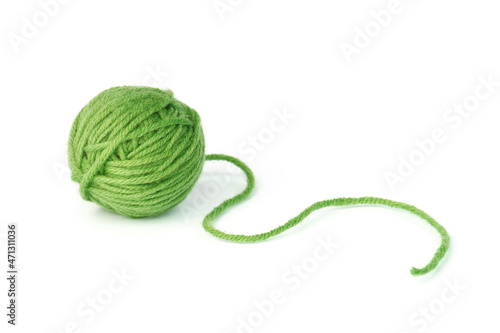 ball of thread isolated on white background. green yarn