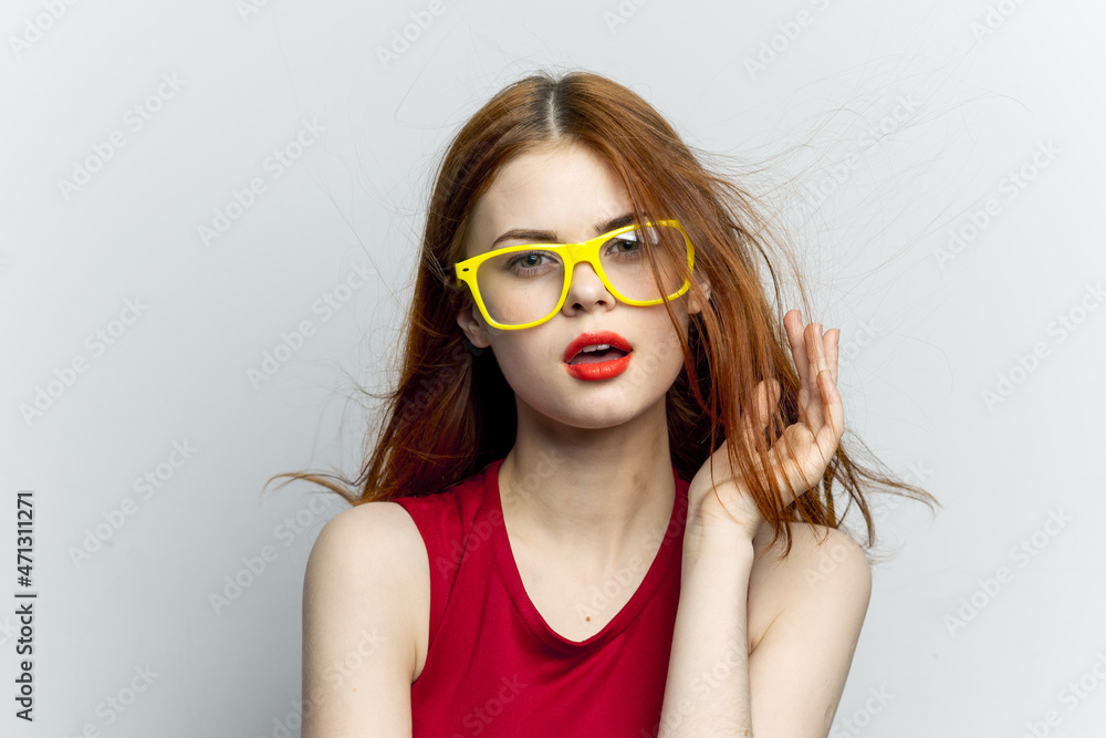 pretty woman yellow glasses hairstyle fashion close-up pretty woman yellow glasses hairstyle fashion close-up
