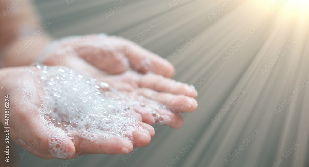 Fototapeta premium hand hold bubbles in palm with light