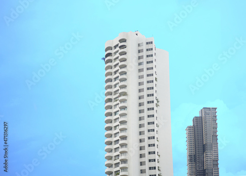 two Modern high-rise buildings towers   against a beautiful sky background