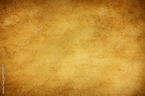 Brown paper texture. Grunge old parchment background. Stained dirty burned message backdrop for graphic design. Vintage ancient empty copy space background. © Paweł Michałowski