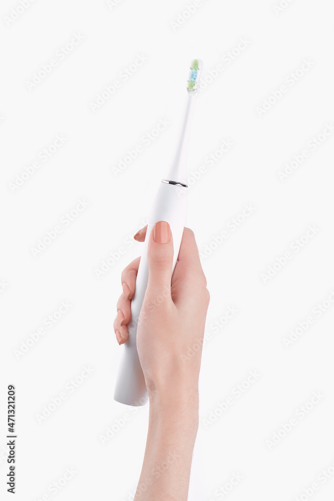 Smart electric toothbrush. Modern technology for health. Healthy teeth. Dentistry. Concept of professional oral care and healthy teeth by using ultrasonic smart toothbrush. Smart electric toothbrush. Modern technology for health. Healthy teeth. Dentistry. Concept of professional oral care and healthy teeth by using ultrasonic smart toothbrush.