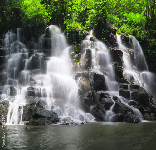 Kanto Lampo Waterfall in jungle Ubud  Bali island Indonesia. Wallpaper background. Natural scenery.
