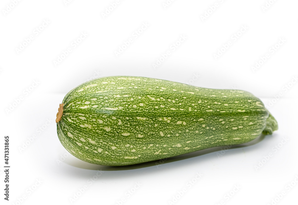 Green zucchini, ripe vegetable on a white background. Green zucchini, ripe vegetable on a white background.