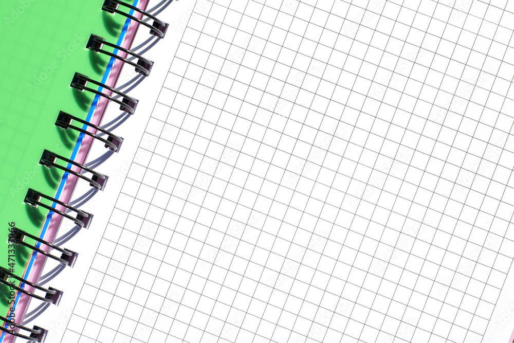 Plaid notebook with green cover close up Plaid notebook with green cover close up