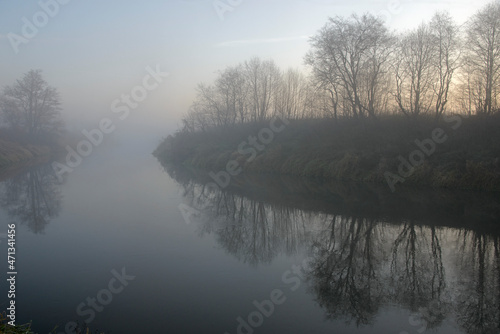 the Russian landscape - the river and the wood in the fall