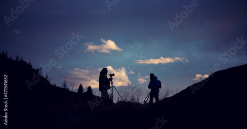 sunset on the lake's shore on dolomites