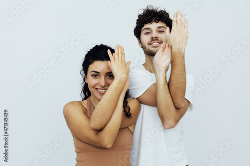 woman and man engaged in paired gymnastics yoga asana