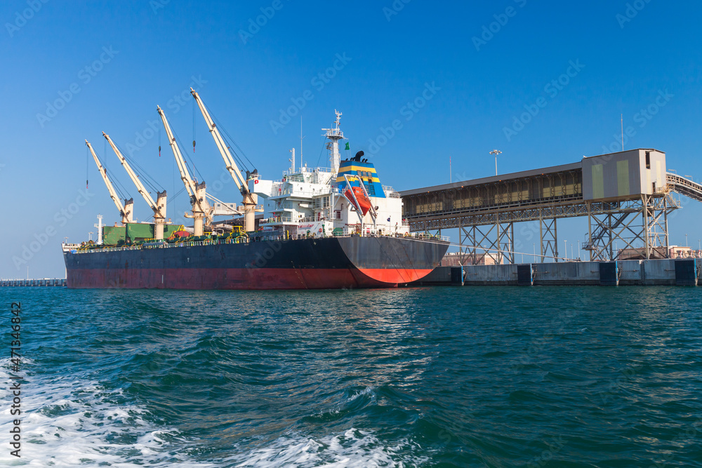 Bulk carrier, cargo ship is loading in port