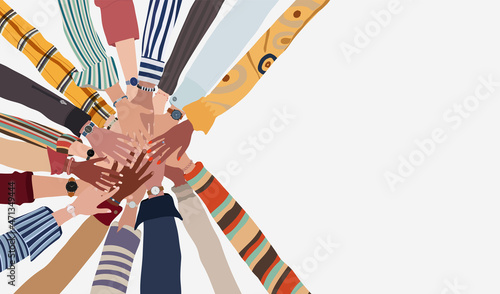 Group of hands on top of each other in a circle of people of diverse culture and race. Cooperation or agreements. Multiethnic colleagues or friends. Multicultural community team or society