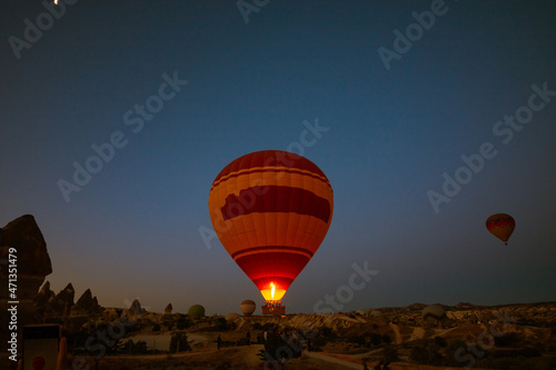Hot Air Balloon. Fire burner of hot air balloon being fired at morning