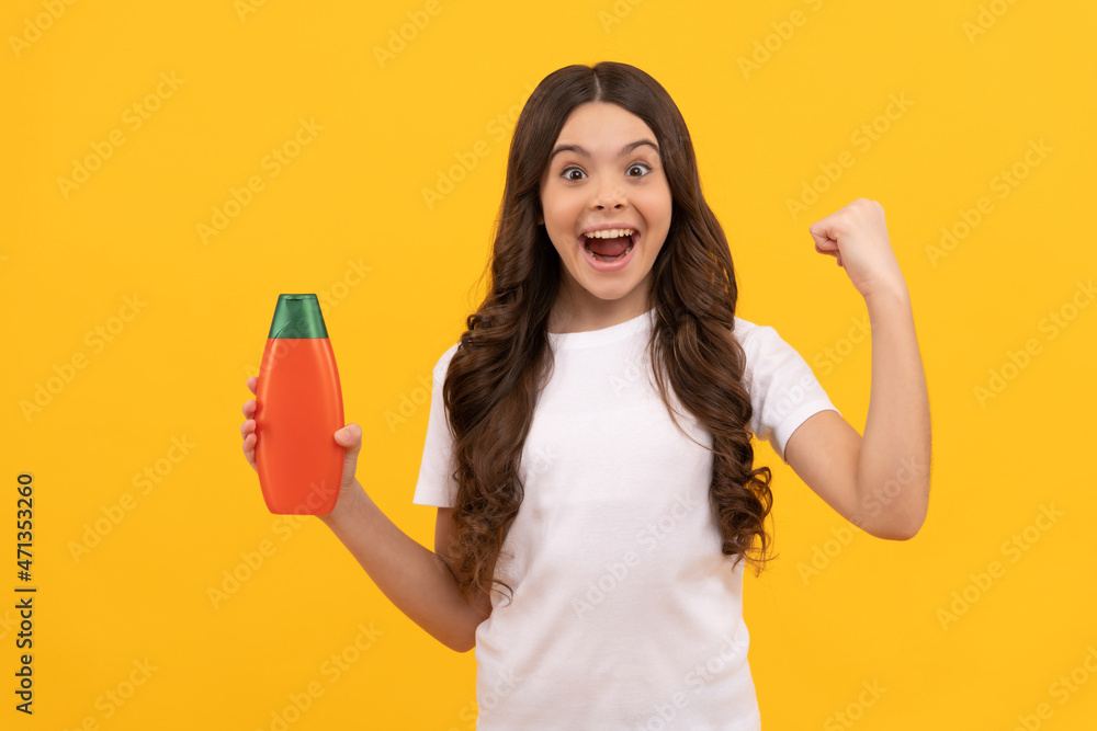 surprised kid with long hair hold shampoo bottle, skin surprised kid with long hair hold shampoo bottle, skin