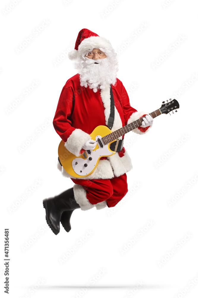 Santa claus jumping and playing a yellow electirc guitar Santa claus jumping and playing a yellow electirc guitar