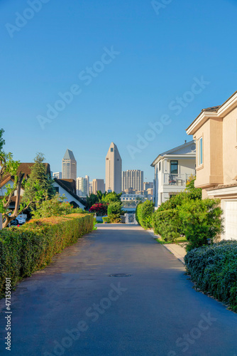 Asphalt pathway in the middle of a residential area at Coronado, San Diego, California © Jason