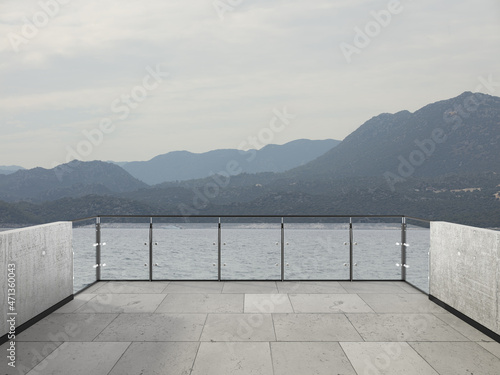 View from the balcony to the sea and mountains.Landscape. Sunny Day. Terrace with a beautiful view. Background with beautiful landscape. City near the sea.