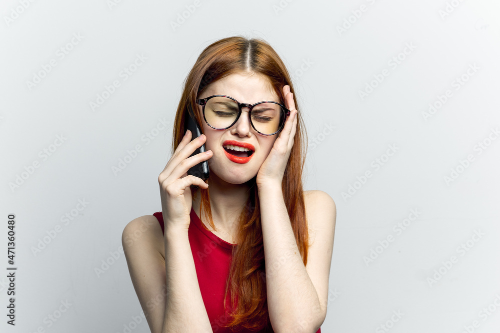 pretty woman with glasses talking on the phone technology lifestyle pretty woman with glasses talking on the phone technology lifestyle