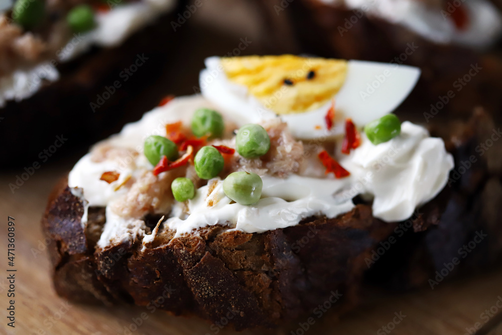 Selective focus. Toast with tuna and egg. Healthy toast. The keto diet. Selective focus. Toast with tuna and egg. Healthy toast. The keto diet.
