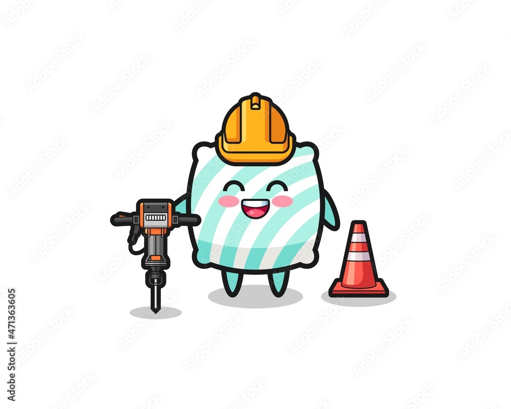 road worker mascot of pillow holding drill machine