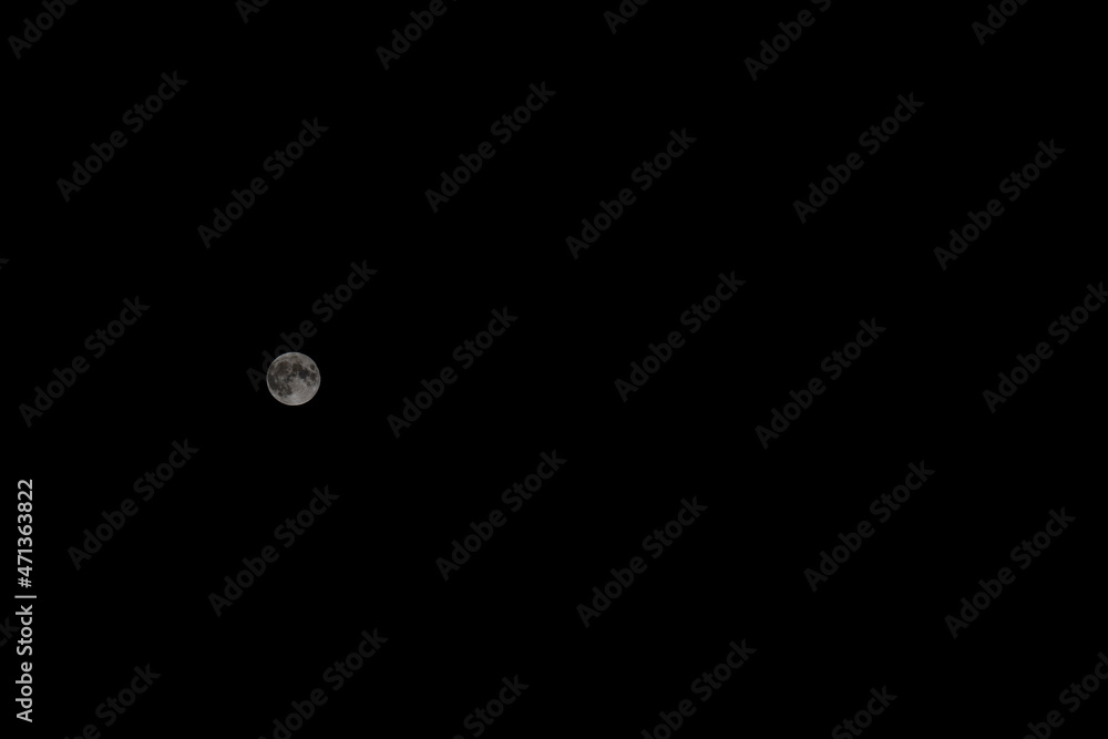 Super moon on black background. Full moon background isolated on black. Super moon on black background. Full moon background isolated on black.