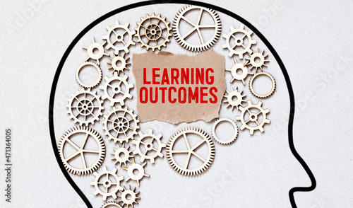 text Learning outcomes concept write on notebook