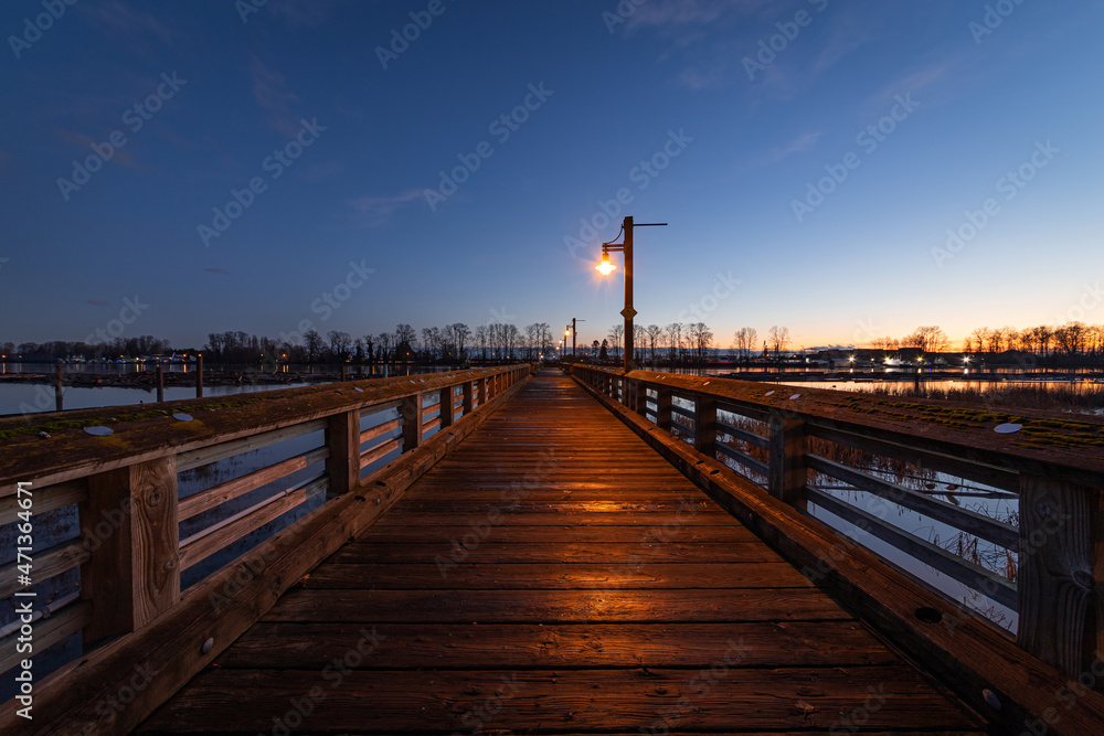pier at sunset on teh Fraser River - Vancouver BC Canada