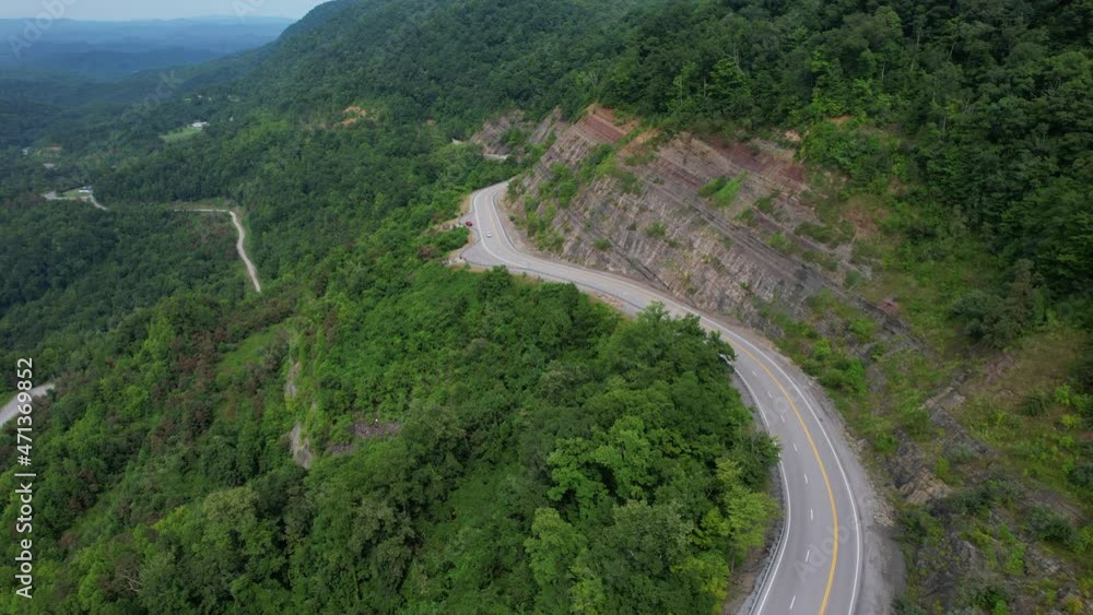 drone view of road on side of mountain drone view of road on side of mountain